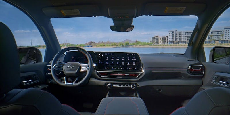 Silverado-EV interior showing dashboard, steering wheel, and large central touchscreen display.