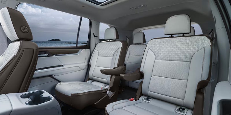 Interior view of the GMC Acadia showcasing its spacious seating, premium materials, and modern cabin design.